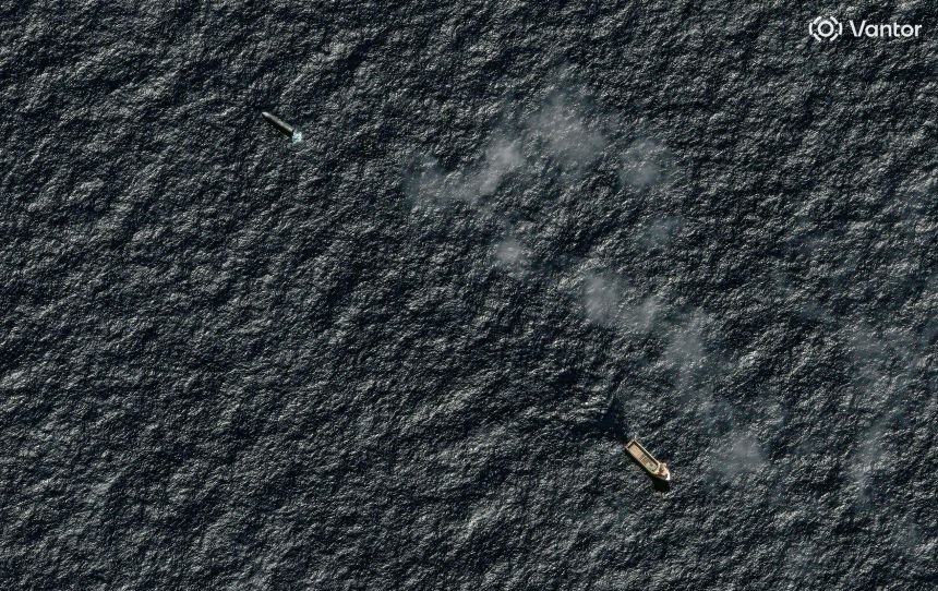 A satellite image taken on August 2 shows Skimmer Tide floating near SpaceX's Starship after it landed in the Indian Ocean.