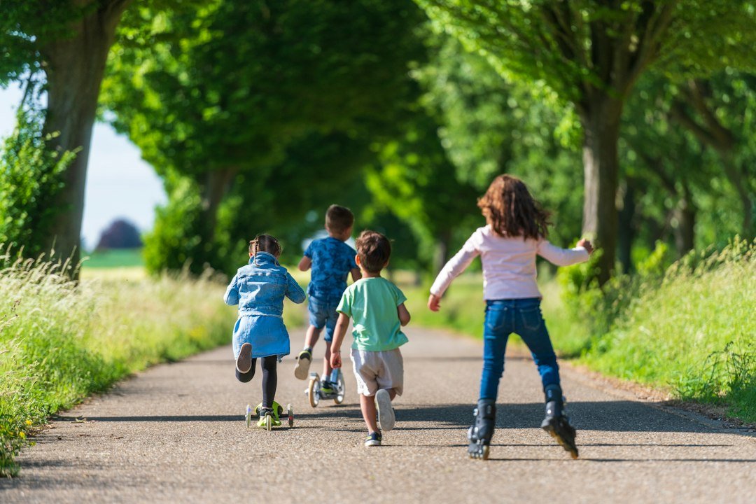 Children exercising outdoors, illustrating healthy activity and obesity prevention