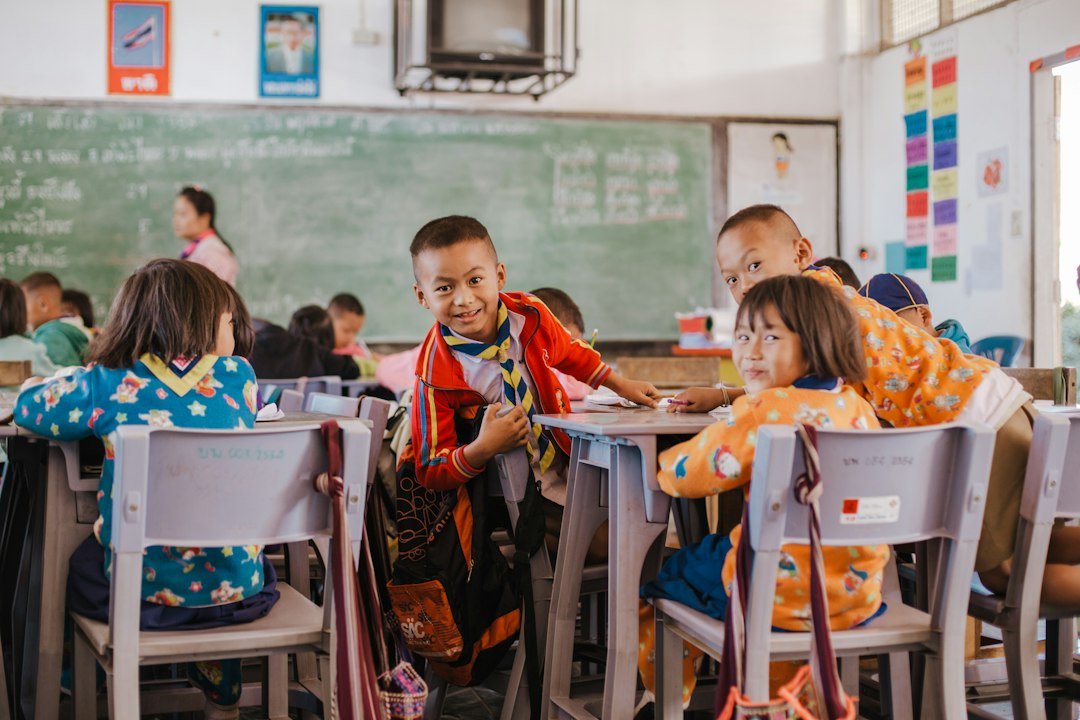 Schoolchildren attending a classroom lesson